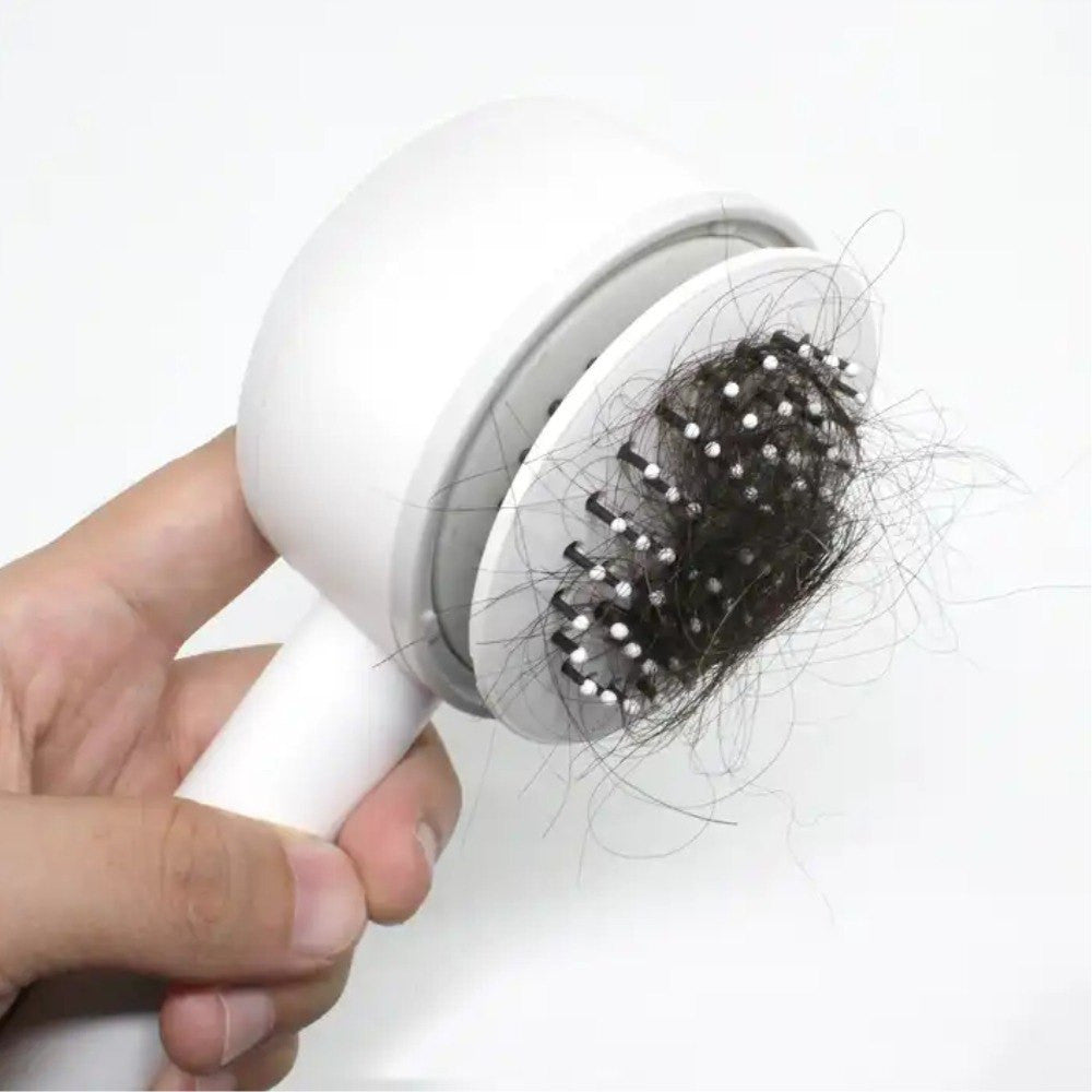 Cepillo autolimpiable estimulador de cabello